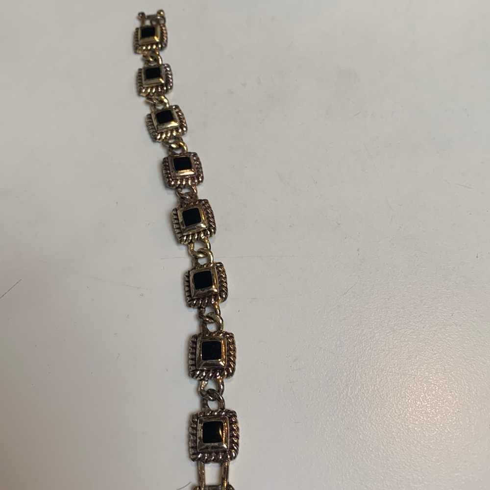 Bracelet. 7 inches. Missing clasp